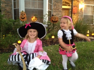 The youngest pirate discovered the that trick-or-treating = candy!